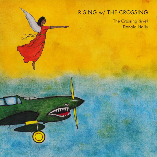 a green propeller plane with a shark face painted on the front, and an angel wearing an orange robe pointing in the same direction the plane is flying. The top of the background is yellow and the bottom is blue.
