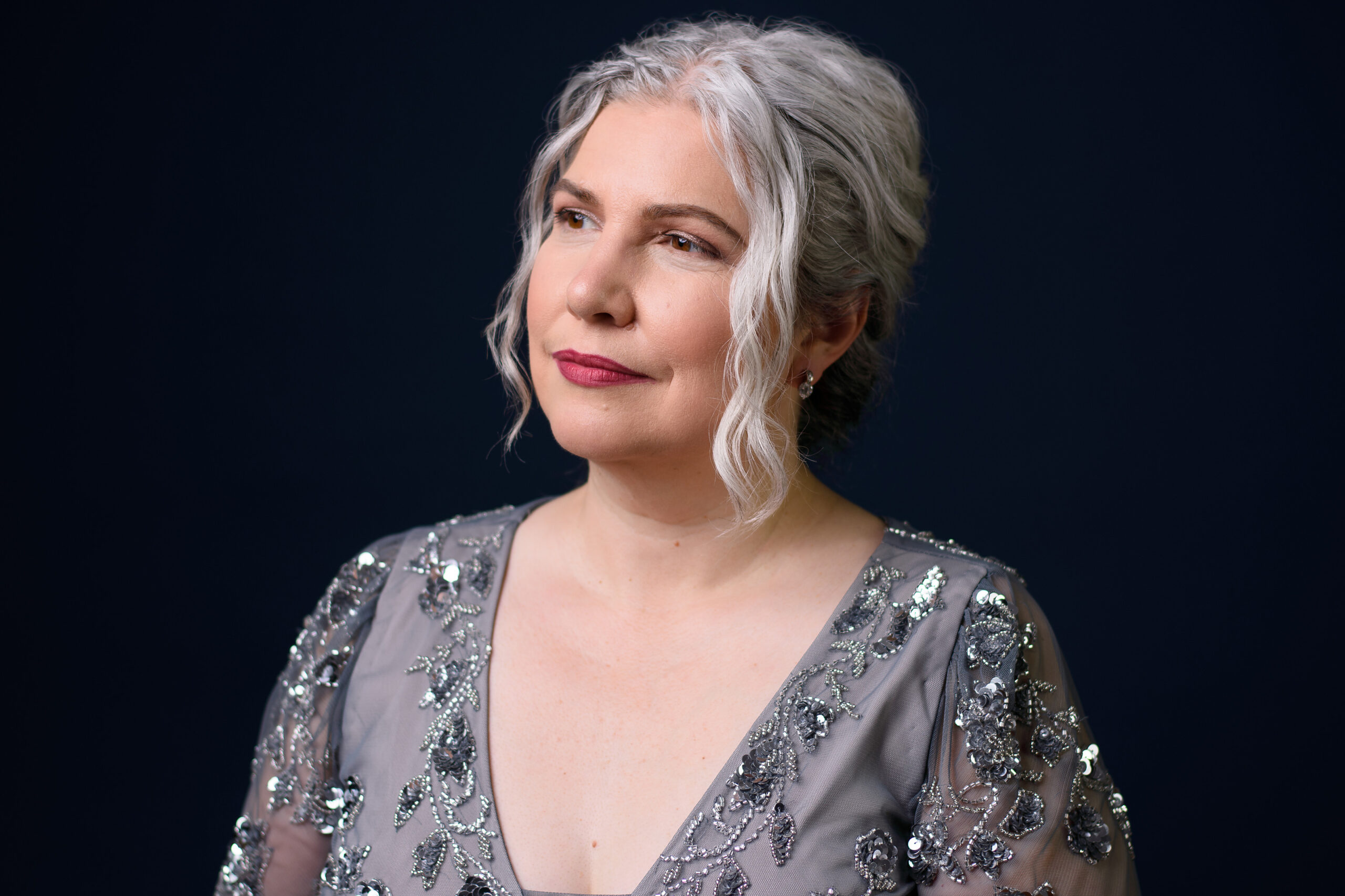 Maren Montalbano in a silver beaded gown